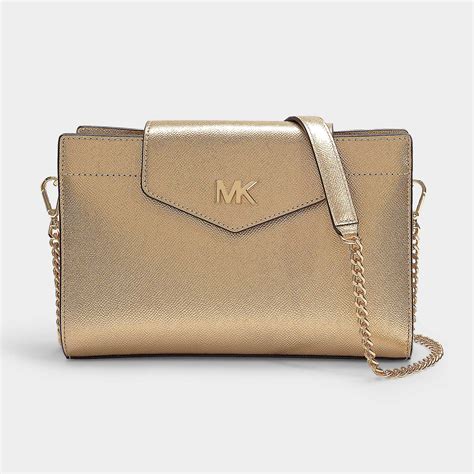 michael kors handbag black gold|Michael Kors gold clutch bag.